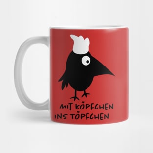 Funny raven as a cook Mug